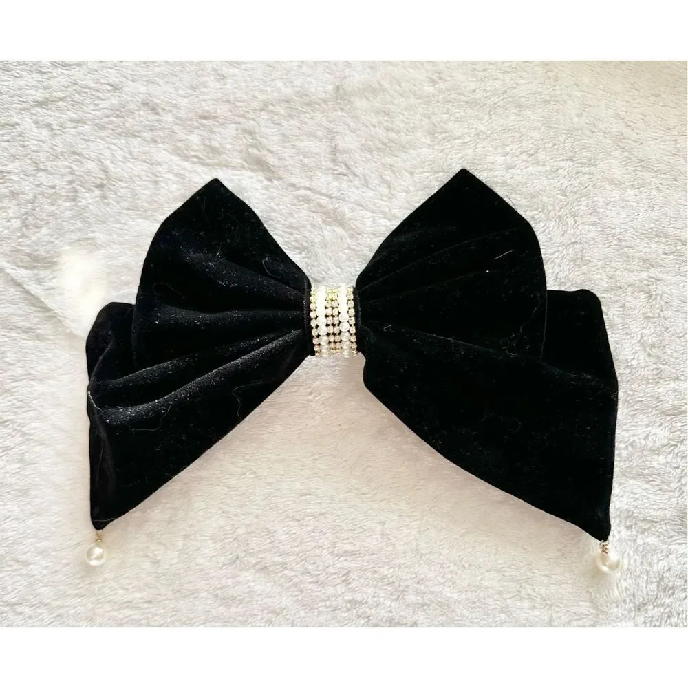Black velvet bow with faux pear and rhinestone accents